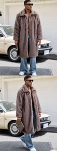 Macro detail of men's brown-grey faux fur long coat with a wide lapel collar and thick texture