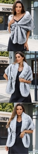 Close-up of grey and white faux fox fur shawl paired with an elegant black dress