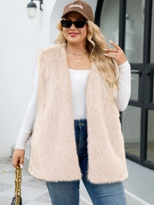 Close-up of fluffy faux fur texture on a light beige long vest for women