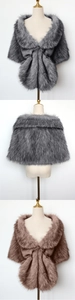 Detail showing plush faux fox fur texture and open front design of grey and brown shawls