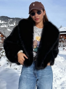 Luxe oversized black faux fur jacket with wide lapels for cozy winter high street fashion