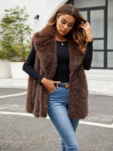Detail of premium brown faux fur vest with large lapels and plush texture for winter