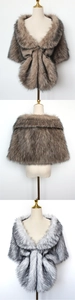 Close-up detail of soft faux fox fur texture in tan and silver grey for evening capes
