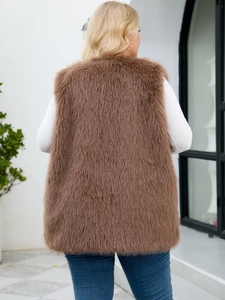 Rear view of long faux fur vest in brown plush material with sleeveless design