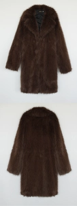Detail of soft brown faux fur texture and smooth black lining on a long sleeve coat