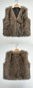 Detailed close-up showing the brown faux fur texture and silky inner lining of the vest