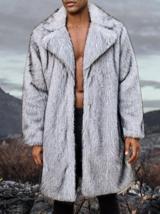 Close-up detail of grey faux fur coat featuring a wide lapel and thick textured fibers