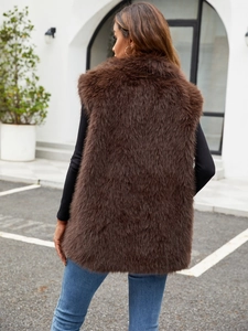 Rear view of long brown faux fur vest for women featuring thick texture and stand collar
