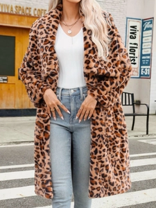 Women's long leopard print faux fur coat with oversized fit and plush texture for winter