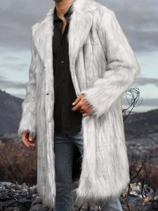 Men's off-white faux fur long coat with lapel collar in a rugged outdoor setting