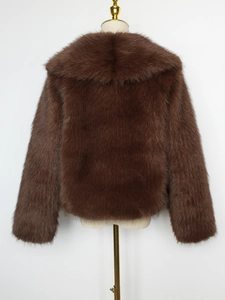 Back view of thick faux fur winter coat in dark brown with fluffy plush texture