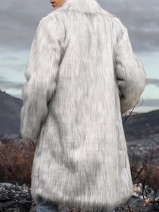 Men's light grey long faux fur coat with notched collar in a mountain landscape view