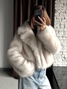 Faux fox fur coat for women with loose oversized fit and stylish lapel collar in beige