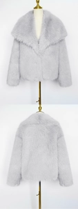 Detail showing plush light gray faux fur texture and large collar on short jacket