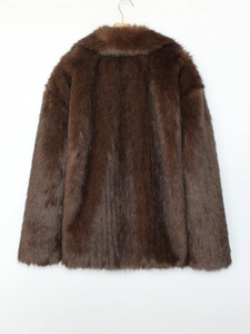 Detailed back view of a dark brown faux fur coat with thick plush texture and wide lapels
