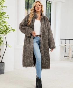 Chic grey-brown faux fox fur coat styled with skinny jeans and black leather boots