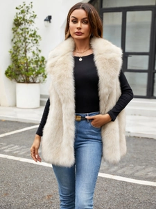 Luxurious cream faux fur vest for women featuring fluffy texture and wide collar style