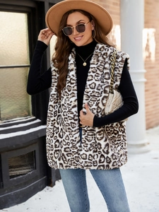 Women's leopard faux fur vest gilet in mid-length styled with a hat and jeans
