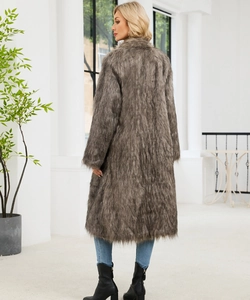 Texture detail of a long-sleeved faux fox fur coat in mixed brown and gray tones