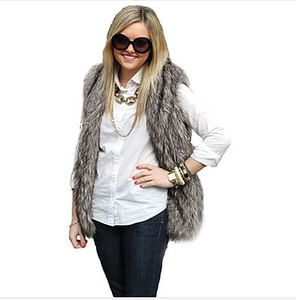 Detail shot of long faux fur texture on a grey and brown mixed sleeveless waistcoat