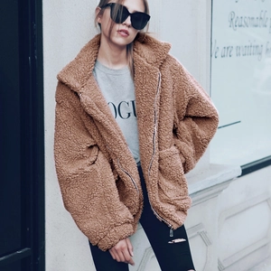 Fashionable camel fleece cropped jacket with zipper and street style aesthetics