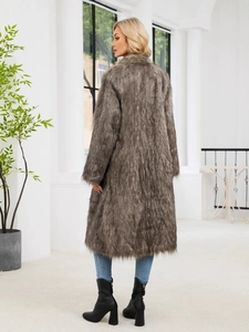 Chic women's faux fox fur coat in brown, showing the back and side view with a long fit