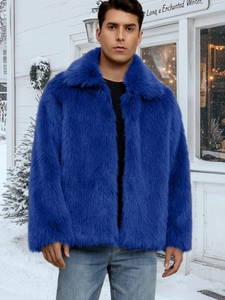 Close-up of bright blue men faux fur winter jacket with thick lapel and warm texture