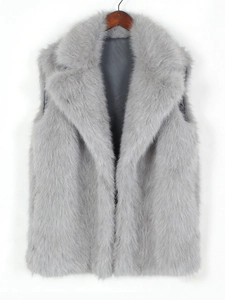 Detail view of grey faux fur vest with dense texture and soft inner lining
