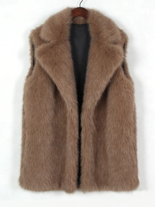 Detail of coffee brown faux fur vest featuring a plush texture and smooth black lining