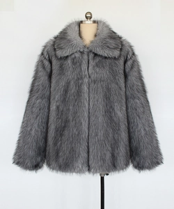 Detailed view of the thick gray faux fur collar and long plush texture on man jacket