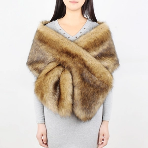 Detail of tan striped faux fur shawl with dense texture and cross-over design
