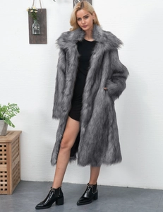 Detail of grey faux fur coat with large lapels and thick texture for winter fashion