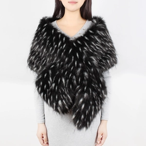Close-up of black and white faux fur shawl with premium long hair texture and soft finish