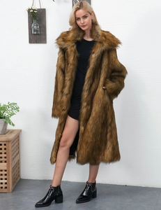 Close-up of a long brown faux fur coat with oversized lapels and fluffy plush texture