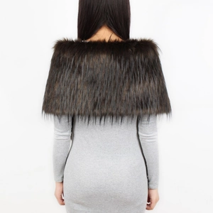 Rear view of long-haired dark brown faux fur shawl over a grey long-sleeved dress