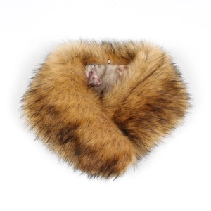 Close-up of fluffy brown faux fur collar with high-quality silky lining and brand tag