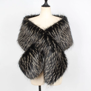 Macro shot of fluffy black and brown faux fur texture on a crossover bridal shawl