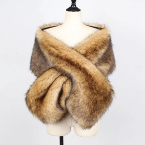 Close-up of fluffy gradient brown faux fur shawl with thick texture and crossover design
