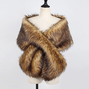 Macro detail of brown faux fur bridal shawl showing gradient animal texture and soft plush fibers