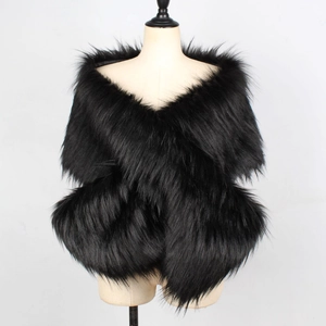 Close-up of black faux fur shawl showing plush texture and criss-cross wrap design
