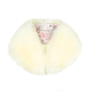 Detail of faux fur shawl lining with vintage illustrations and soft cream fur texture
