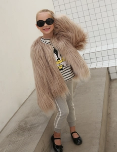 Fashionable beige faux fur jacket for kids with long sleeves and fluffy lamb wool texture