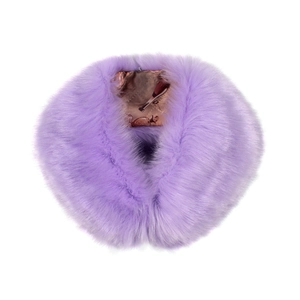 Detail of light purple faux fox fur scarf showing soft texture and printed lining pattern