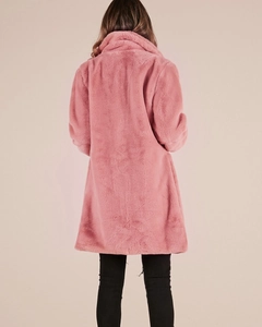Rear view of a plush dusty pink faux fur coat featuring a warm stand-up collar and long sleeves