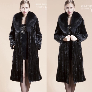 Close-up of the long black faux mink fur coat featuring a thick fluffy collar and warm texture