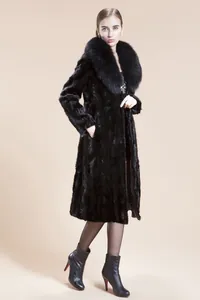 Faux mink fur coat with large lapels styled with a sequin dress and stiletto ankle boots