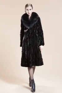 Detail of luxurious black faux mink coat with large collar and glossy fur texture