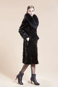 Detail view of long black faux mink fur coat with large collar and thick smooth texture