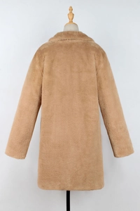 Detailed back view of a camel faux fur coat with neat stitching and elegant lapel