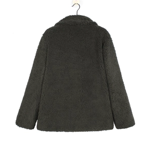 Detail view showing back of dark grey faux fur coat with thick granular texture fabric